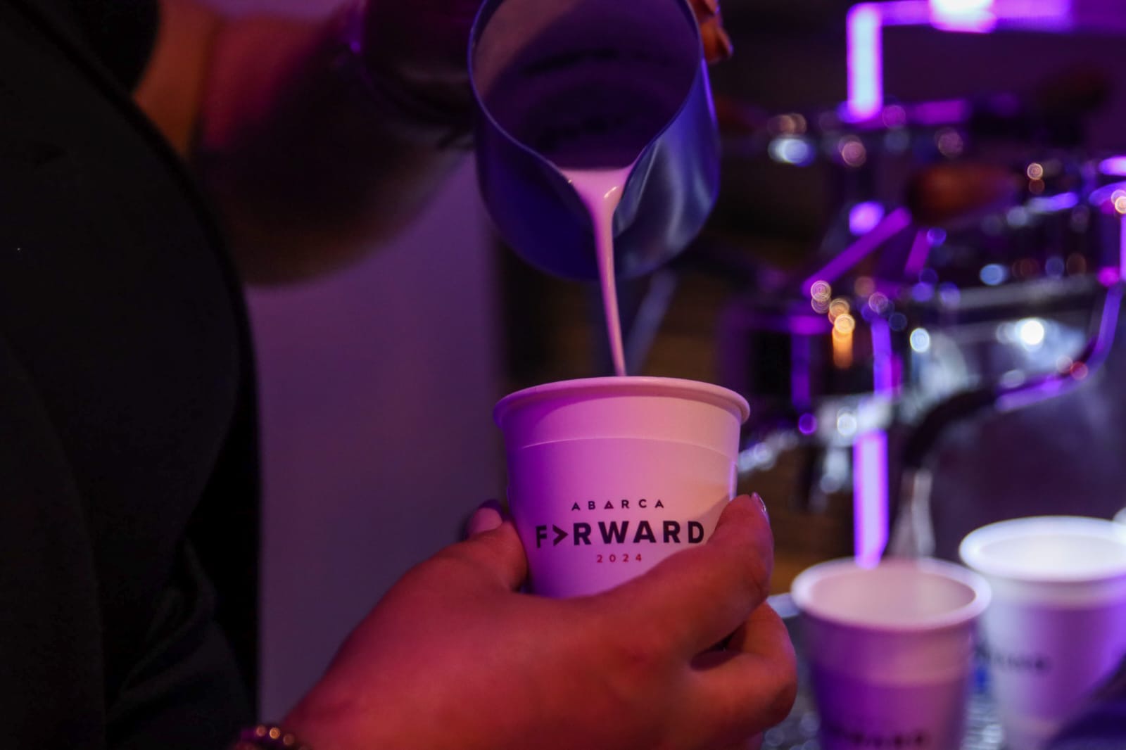 Branded barista station with local coffee at Abarca Forward 2024.