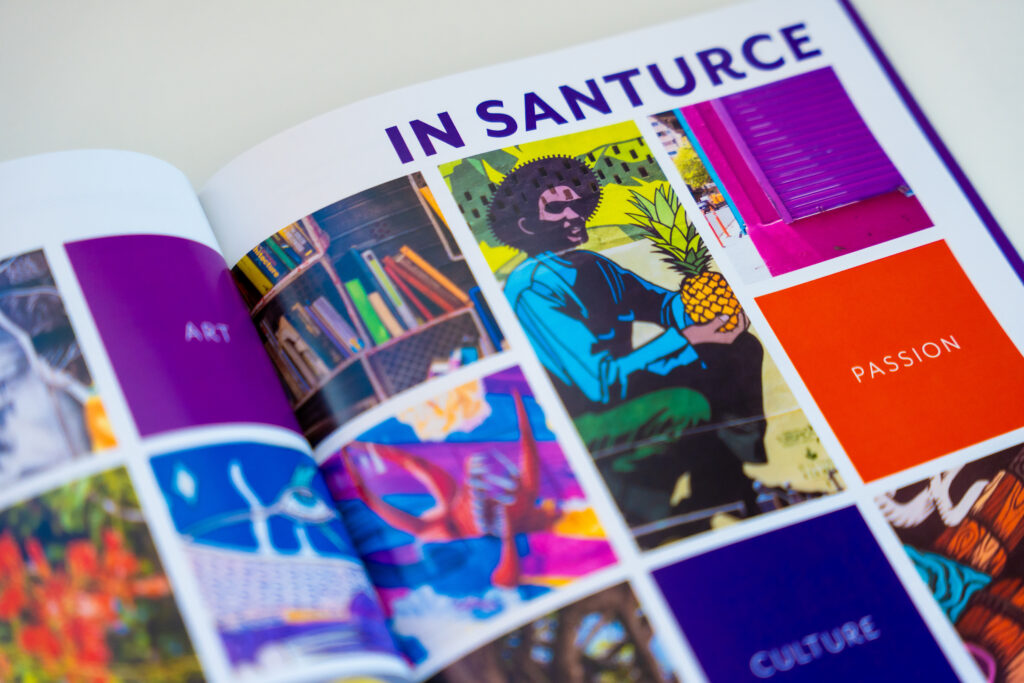 Open booklet by Abarca Health displaying a colorful spread titled “IN SANTURCE,” featuring a collage of vibrant images including street art, bookshelves, a mural of a person holding a pineapple, and bold color blocks labeled “PASSION” and “CULTURE,” highlighting the artistic energy of the Santurce community
